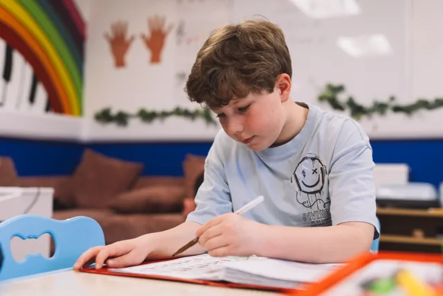 A pupil working on a music theory exercise at The Piano Lab