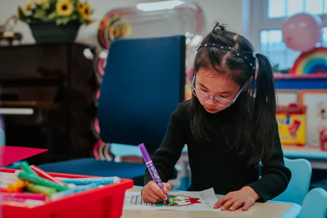 A pupil working on a music theory activity